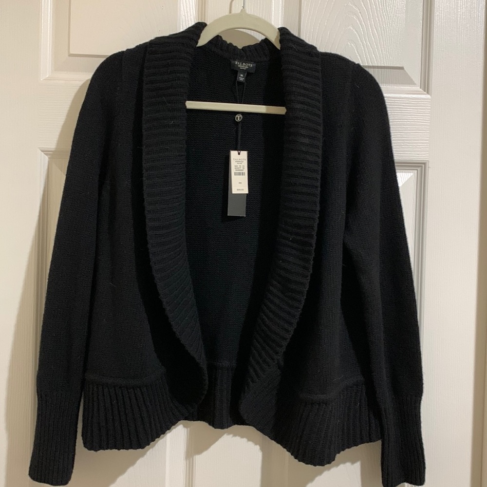 Very pretty shawl collar sweater.  Never worn.  Perfect co you.